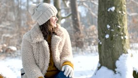 Young happy women in winter forest Video 4k