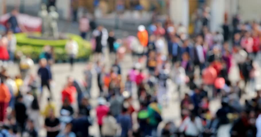 Blur of city with crowded of people in the street