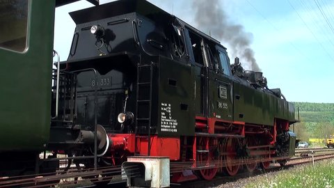 BLUMBERG,GERMANY,Summer 2018,Wutach Valley Railway,Sauschwaenzle railway line,
steam train puffing at the station FUETZEN, Black Forest countryside
