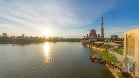 High Angle Golden Sunset Time Lapse at Putra Mosque by Putrajaya lake in Putrajaya, Malaysia. Day to Night.