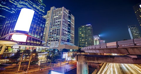 4K timelapes night of bangkok, at skytrain station Chong Nonsi skywalk (BTS) on the Silom Line, Concept of business city.
