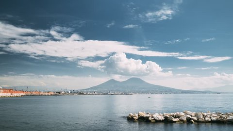 Naples, Italy. Volcano From Area Of Santa Lucia In Naples. Landscape With Mount Vesuvius And Tyrrhenian Sea In Summer Day