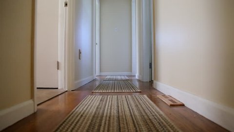 Camera Glides Down Home Hallway