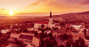 Nitra castle in Slovakia sunset red colored, drone shot