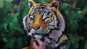 Artistic hand-painting of a tiger's head,video session