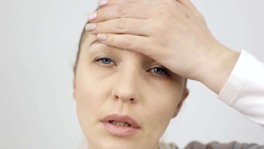 severe headache in a woman