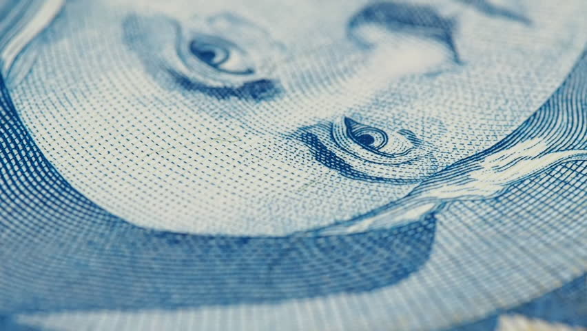 Christopher Columbus portrait on Bahamas 1 dollar macro slow rotating. Low angle. Stock video footage