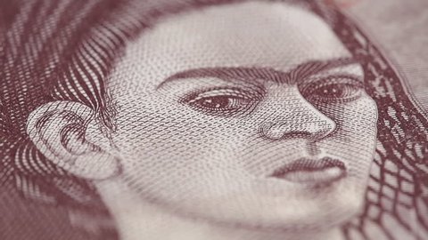 Frida Kahlo on Mexico 500 peso bill macro slow rotating. Low angle. Stock video footage.