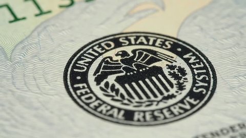 Federal Reserve System Seal on US 20 dollar bill macro slow rotating. Low angle. Stock video footage