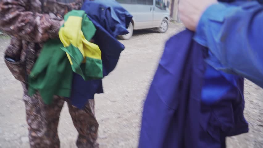 Mechanics try on new work clothes