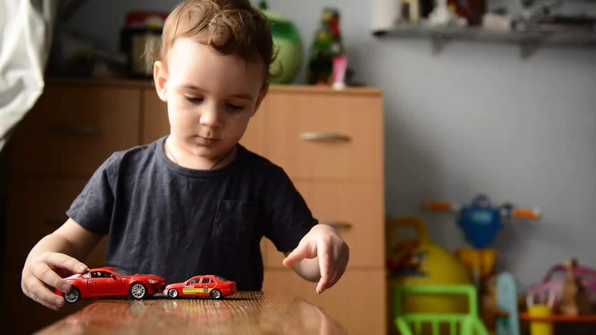 little boy playing toy car children's Stock Footage Video (100% Royalty ...