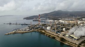 Aerial drone video of oil and gas refinery in industrial area of Elefsina, Attica, Greece