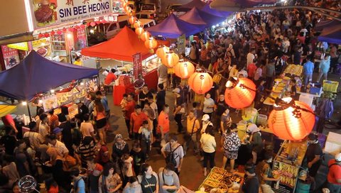 Kota Kinabalu Sabah Malaysia.Feb 3, 2019 : Crowded people in motion at night market on Feb 3, 2019 in Kota Kinabalu, Sabah.Night market is popular spot among Malaysian to buy bargain items.
