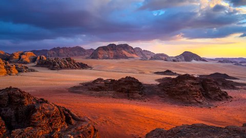 Time lapse Movie Sunset Scene of Wadi rum Desert in Jordan, It is also known as the Valley of the Moon, Many Movie Shot in Wadi Rum