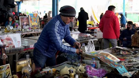 ISTANBUL, TURKEY - FEBRUARY 3, 2019: Sellers are waiting customers at flea market Feriköy, Bomonti