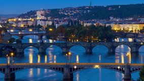 city of prague time lapse night to day zoom out on vltava river bridges