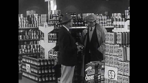 CIRCA 1950s - Two men in a car dealership discuss socialism versus capitalism in the 1950s
