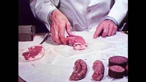 CIRCA 1940s - Pork is artificially digested to test for the parasite Trichinosis in the 1940s