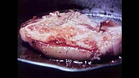 CIRCA 1940s - Thorough cooking is required to kill the parasite Trichonisis in pork in the 1940s