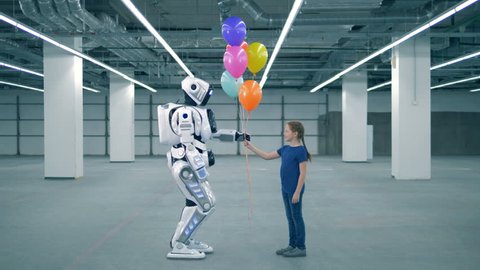 Concept of future. One girl presenting balloons to a droid, side view.