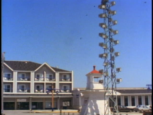 GIMILI, CANADA, 1990, Purple martin tower, bird house with birds, Lake Winnipeg