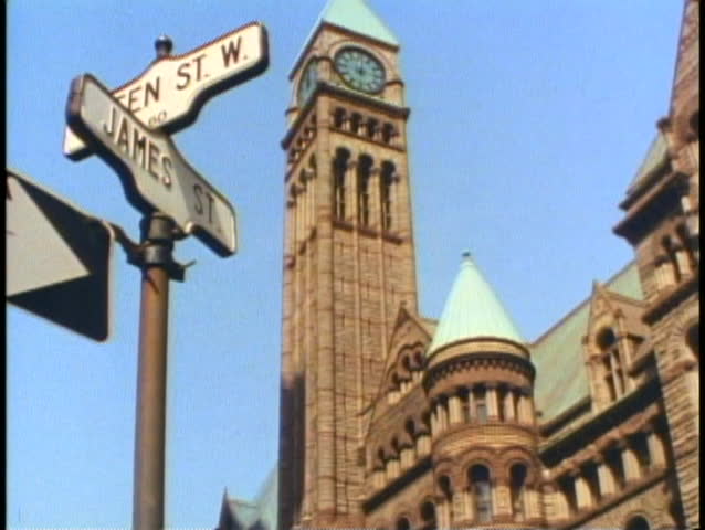 TORONTO, ONTARIO, 1990, Old City Hall, stone clock tower, two street signs
