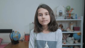schoolgirl cexperiencing joy happiness surprise. emotion positive concept children. slow motion video. girl teen surprised with joy happiness ecstatic in disbelief lifestyle emotional expression
