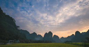 Time lapse, timelapse sunset sky landscape. Rice field in village mountain, Vietnam. Royalty high-quality free stock time lapse video footage sunset sky rice fields harvest season at village mountain