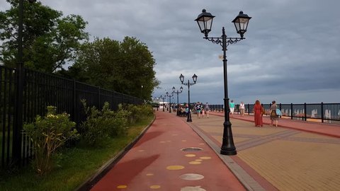 Sochi, Russia - June 5. 2018. Movement along the embankment on bike path to Adler