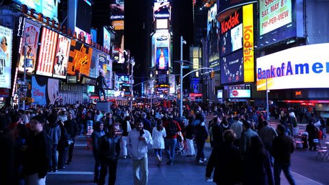 NEW YORK CITY, USA - MARCH 5, 2010 Time Lapse of Tourists People Walk in Famous Times Square in New York City Night