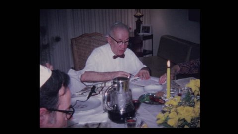 1971 Jewish family prays and sings at Passover seder