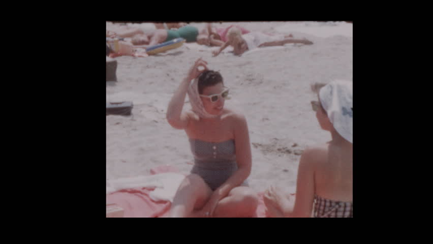 1958 couples on the beach | Shutterstock HD Video #1023592423