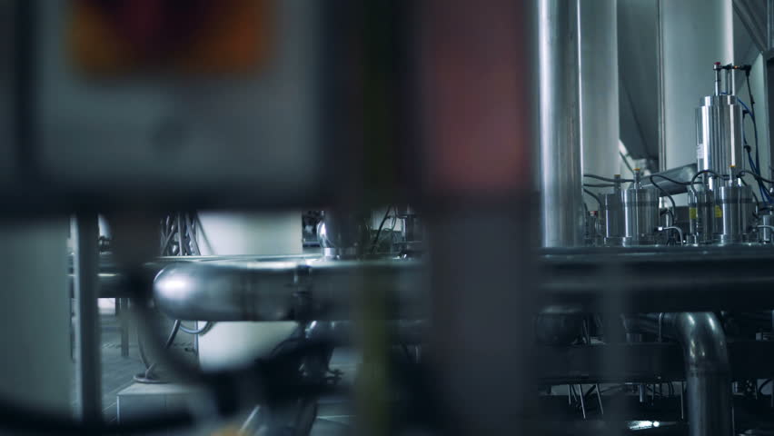 Brewery equipment in a room, close up.