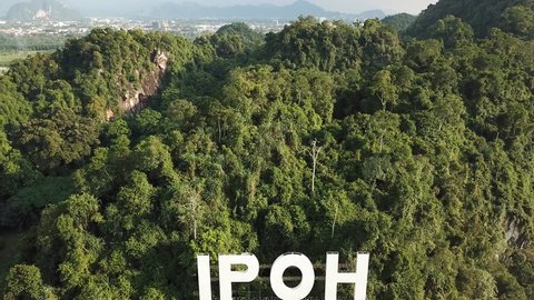 IPOH,MALAYSIA. FEBRUARY 5, 2019 : Aerial view of IPOH signage attach at mountain near highway Ipoh, Ipoh is a capital state of Perak Malaysia