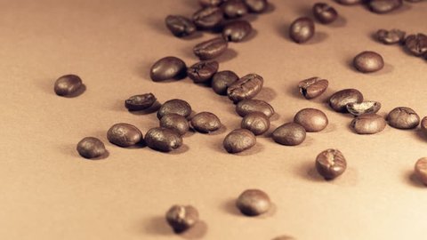 Coffee beans on the background of light burlap