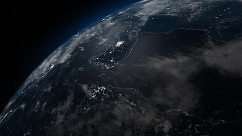 South Korea and North Korea from space with moving clouds at night.