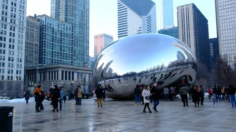 CHICAGO, IL - FEBRUARY 2, 2019 - People walking in Millennium Park. Cloud Gate also called The Bean is a main attraction in downtown Chicago 