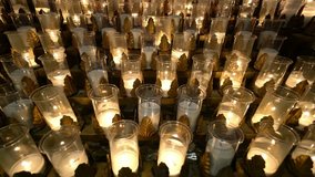 Close up shot of some candles of the Basilica of Sainte-Anne-de-Beaupre church at Quebec, Canada