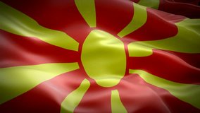 Macedonia flag video waving in wind. Realistic North Macedonian Flag background. Macedonia Flag Looping Closeup 1080p Full HD 1920X1080 footage. Macedonia EU European country flags footage video 