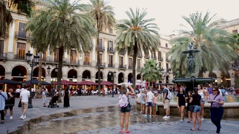 BARCELONA, SPAIN - AUGUST 21, 2018:  Evening view of Placa Reial in summer. Barcelona, Catalonia