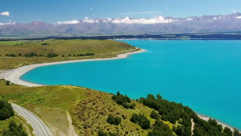 Panoramic view of glacier lake Pukaki famous for the incredible blue coloured water and scenic road along the lake, South Island, New Zealand