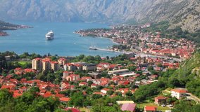 Summer cityscape of Kotor port. Morning view of Kotor bay and  limestone cliffs of Mt. Lovcen. Sunny Adriatic seascape. Beautiful world of Mediterranean countries. Full HD video (High Definition).
