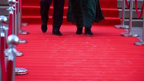 Famous people are walking on the red carpet, close up