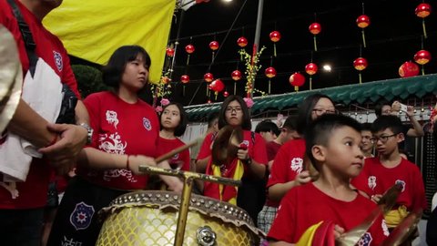 Kuil Kuno Johor Temple, Johor Bahru/Malaysia, February 4, 2019: Young drums team performing during the celebration of Chinese New Year.