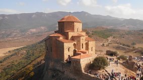 Dramatic. drone perspective of Jvari Orthodox Monastery. a sixth century landmark on a remote mountain top in eastern Georgia. FullHD video