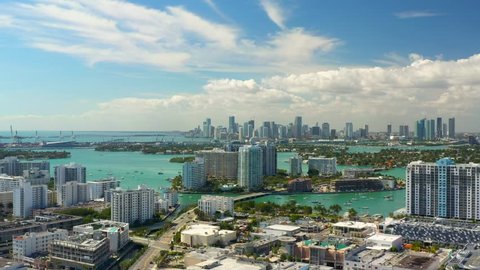 Aerials of Miami Beach condominiums summer vibes travel destination 4k