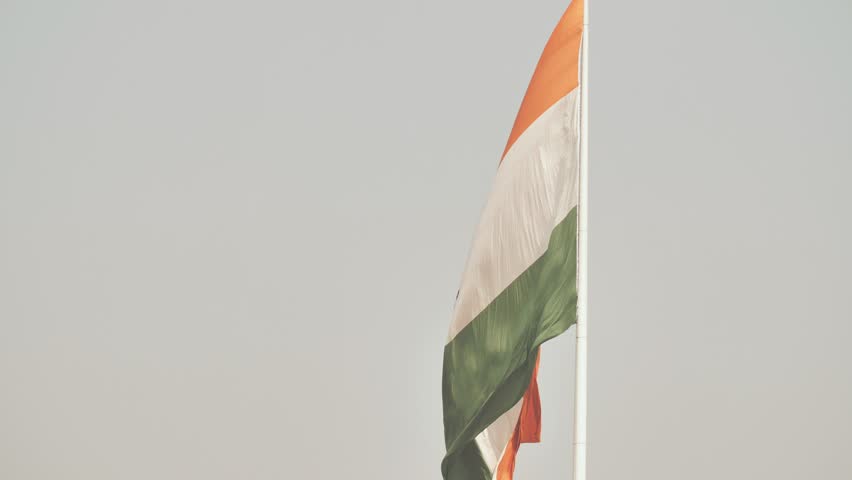 Huge Indian flag winding up on Delhi Square.