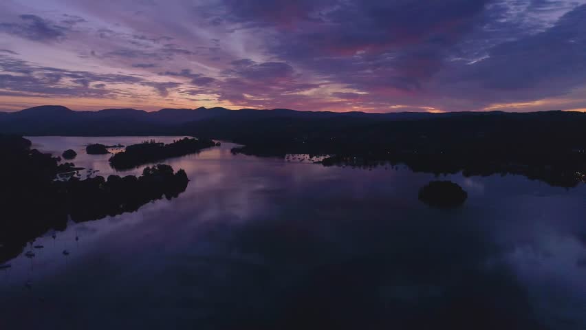 Sunrise over Windermere, reflections of clouds, Lake District