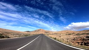 Driving on a earth road. POV Video Footage in 4K. Fuerteventura