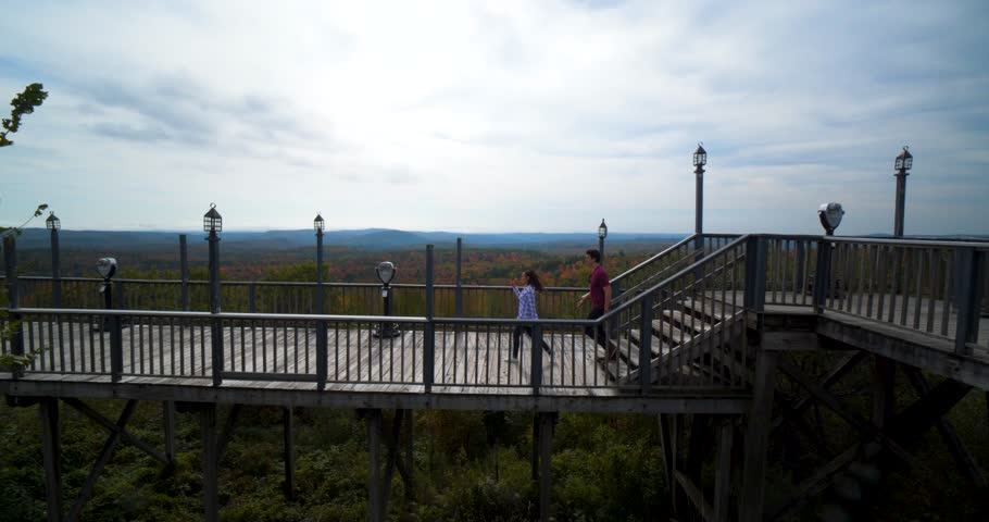 Couple Looking Out Over Forest, Wilderness, Vermont Mountains